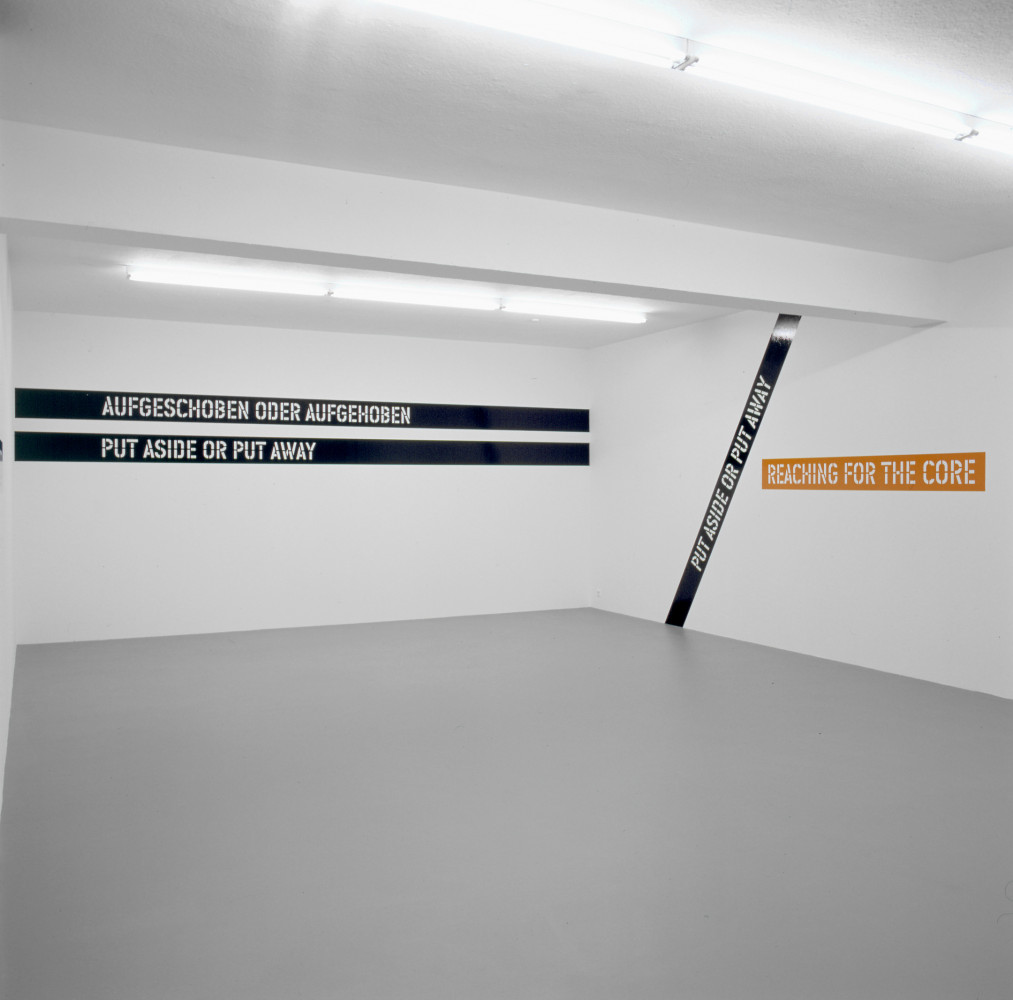 Lawrence Weiner, ‘AUFGESCHOBEN ODER AUFGEHOBEN NACH DEM KERN GREIFEN PUT ASIDE OR PUT AWAY REACHING FOR THE CORE’, Installation view, 2002