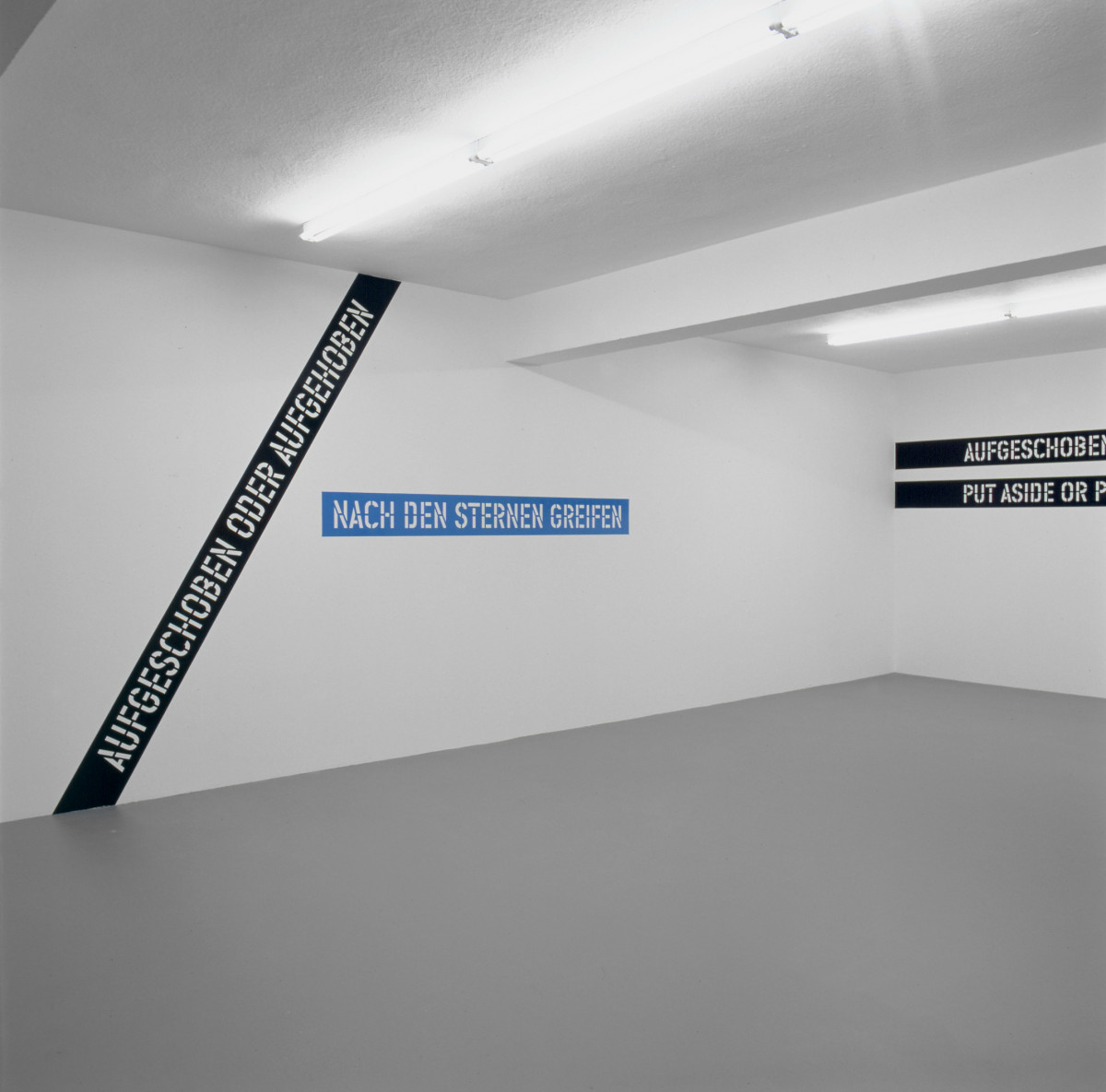 Lawrence Weiner, ‘AUFGESCHOBEN ODER AUFGEHOBEN NACH DEN STERNEN GREIFEN PUT ASIDE OR PUT AWAY REACHING FOR THE STARS’, Installation view, Buchmann Galerie, 2002
